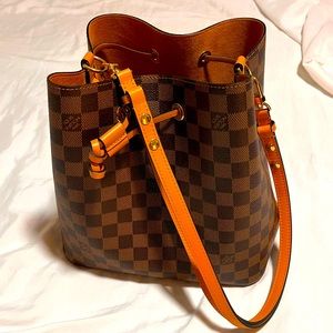 Louis Vuitton draw string crossbody and shoulder bag